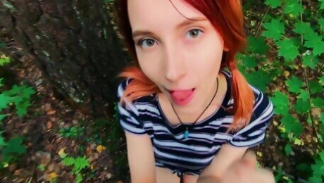 Cute redhead kneels to swallow in scenes of soft outdoor POV
