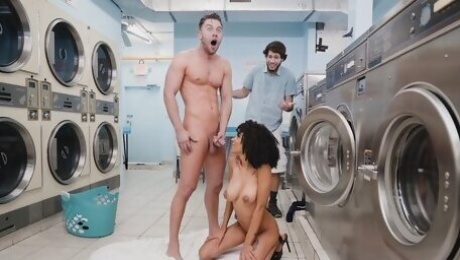 Busty ebony Ariana Aimes takes white cock from behind in laundromat