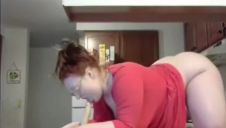 chubby bbw sucks dido on countertop